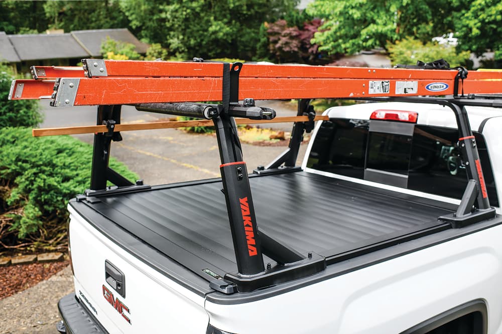 Yakima Overhaul System and Retrax XR series bed cover combination on a GMC